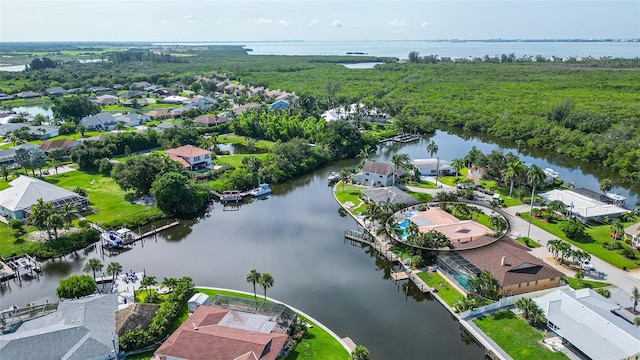 bird's eye view with a water view