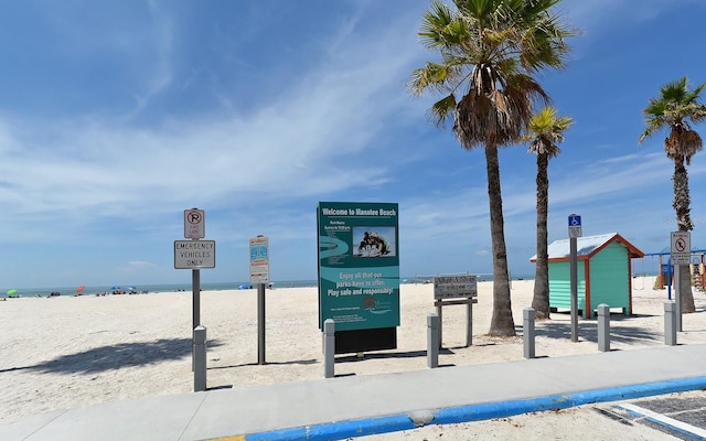 exterior space featuring a beach view