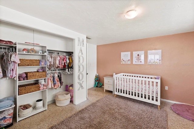 bedroom with a nursery area