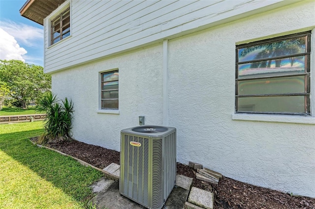 5111 Coral Blvd, Bradenton, FL 34210 - exterior view of central AC unit and stucco siding
