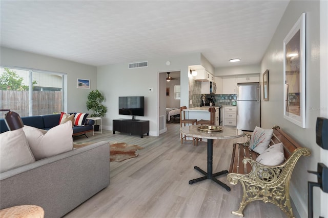 living room featuring light hardwood / wood-style floors