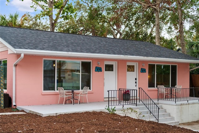 ranch-style home with a patio area