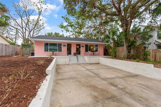 ranch-style house featuring a porch