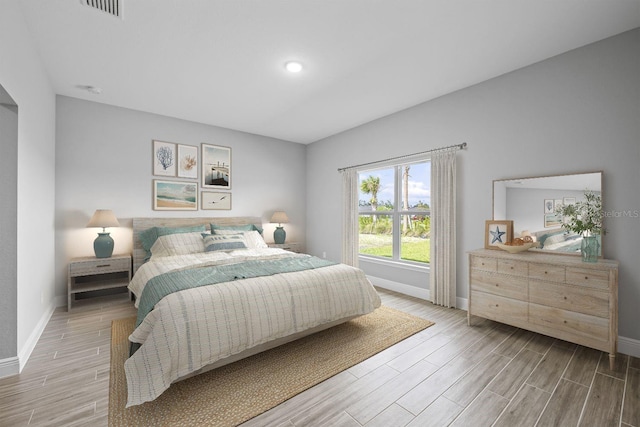 bedroom with light wood-type flooring