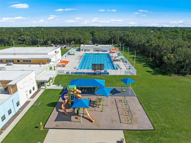 view of pool featuring a playground