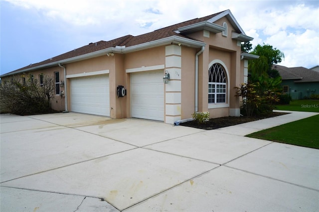 ranch-style home with a garage