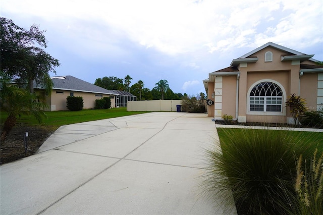 exterior space with a lawn