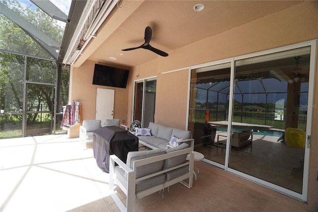 view of patio with ceiling fan, an outdoor hangout area, and a lanai