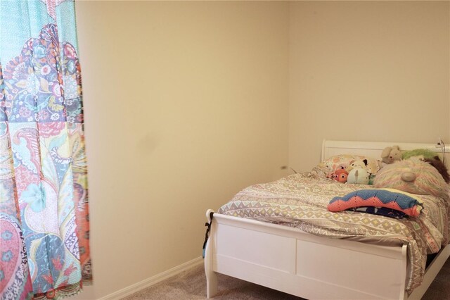 bedroom featuring carpet floors