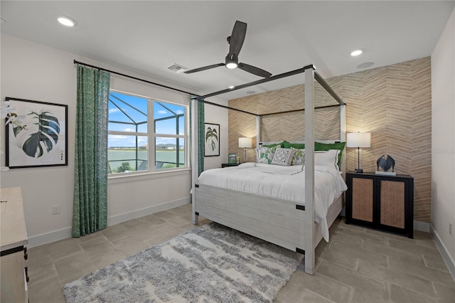 bedroom featuring ceiling fan and light tile patterned floors