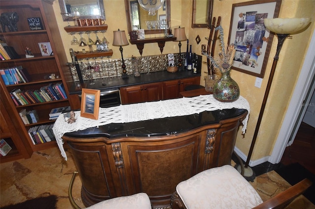 bar featuring tile patterned floors