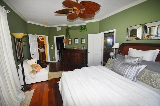 bedroom with ceiling fan, hardwood / wood-style flooring, and ornamental molding