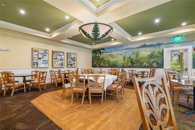 dining area with ornamental molding, beam ceiling, and coffered ceiling