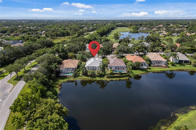 drone / aerial view with a water view