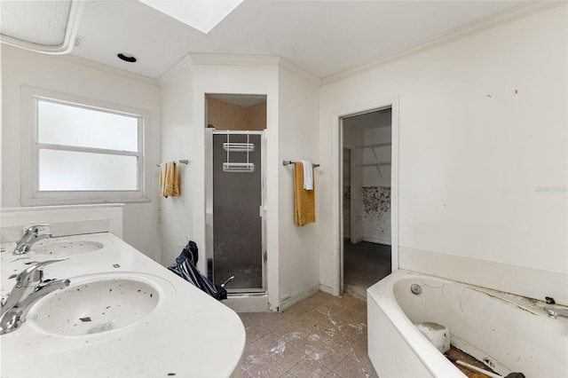 bathroom with vanity, tile patterned floors, separate shower and tub, and crown molding