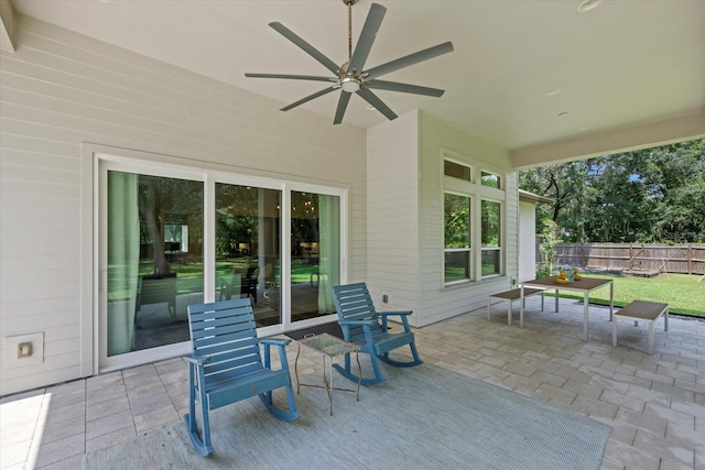 view of patio with ceiling fan