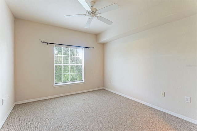 unfurnished room with ceiling fan, carpet floors, and baseboards