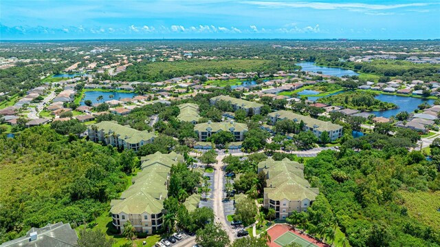 bird's eye view with a water view