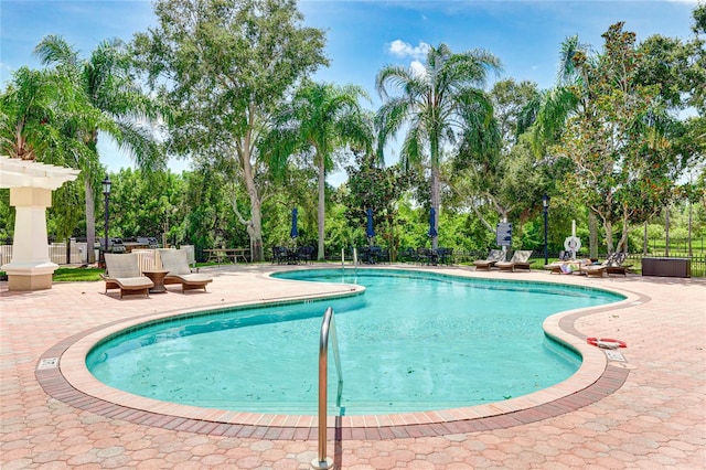 view of pool featuring a patio area