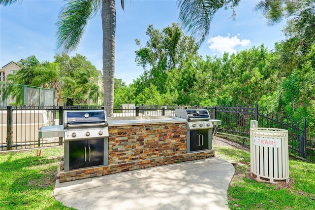 view of patio / terrace with fence, grilling area, and area for grilling