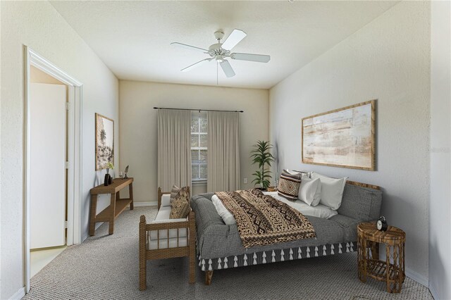 bedroom featuring ceiling fan and carpet