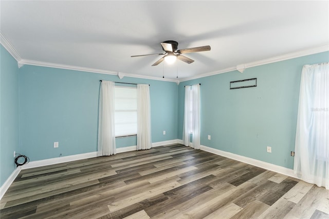 unfurnished room with ceiling fan, crown molding, and wood-type flooring