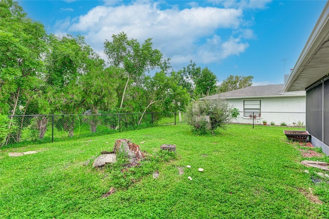 view of yard featuring a fenced backyard