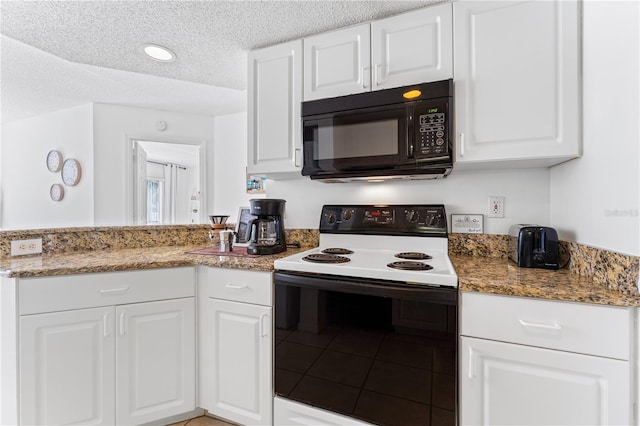 kitchen with white cabinets, light stone counters, white electric range oven, and a textured ceiling