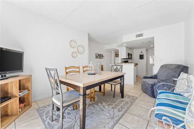 view of tiled dining room