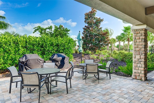 view of patio featuring a grill