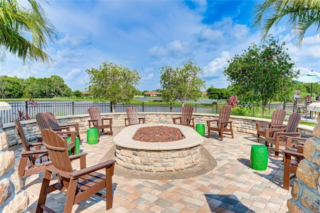 view of patio / terrace featuring an outdoor fire pit