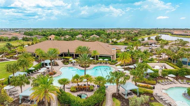 birds eye view of property featuring a water view