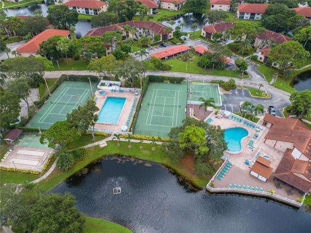 aerial view featuring a water view and a residential view