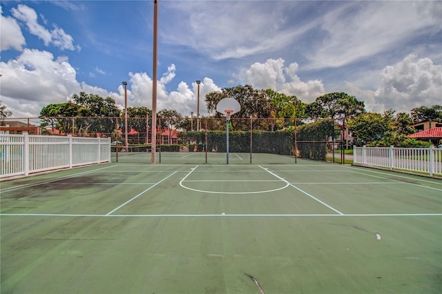 view of sport court with community basketball court and fence