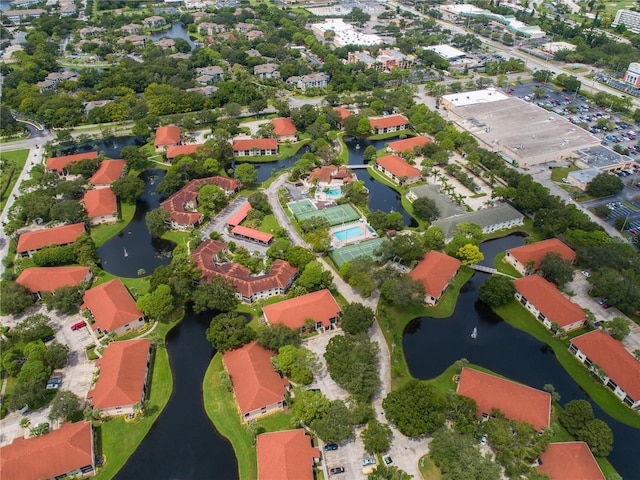 aerial view featuring a water view and a residential view