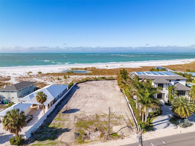 drone / aerial view with a view of the beach and a water view