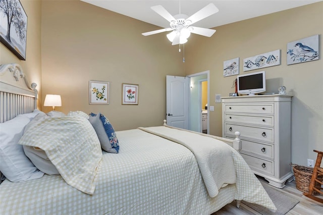 bedroom featuring ceiling fan and light hardwood / wood-style flooring