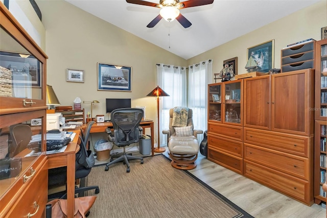 office area featuring ceiling fan, light hardwood / wood-style flooring, and lofted ceiling