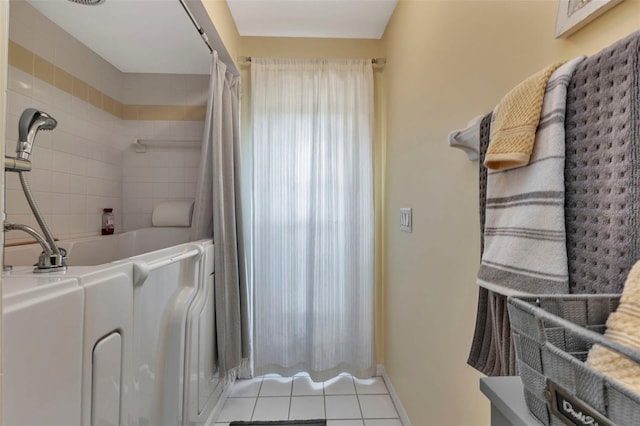 bathroom with tile patterned flooring