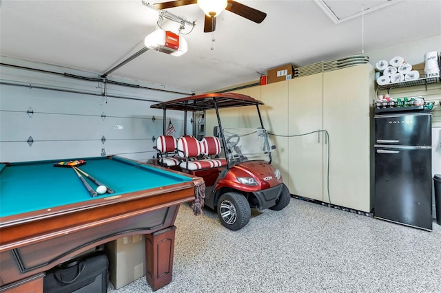 garage with ceiling fan and a garage door opener