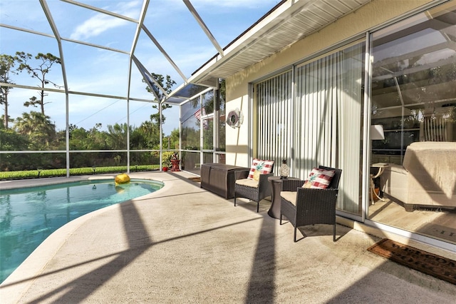 view of swimming pool featuring a patio and a lanai