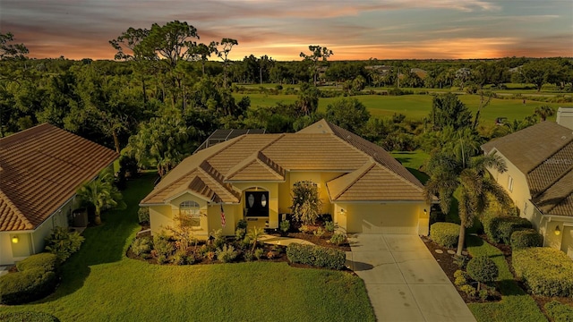 view of front of home with a yard