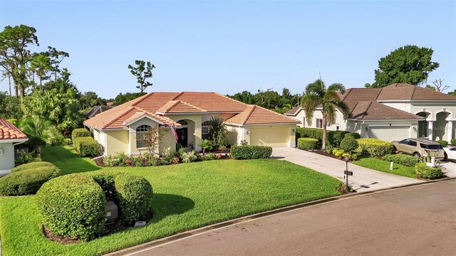 13791 Palmetto Point Ct, Port Charlotte, FL 33953 - mediterranean / spanish house with a tile roof, a garage, a front lawn, concrete driveway, and stucco siding