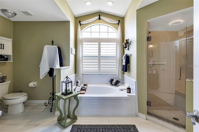 13791 Palmetto Point Ct, Port Charlotte, FL 33953 - full bath featuring tile patterned flooring, toilet, a shower stall, visible vents, and a garden tub