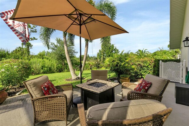 13791 Palmetto Point Ct, Port Charlotte, FL 33953 - view of patio / terrace featuring a fire pit