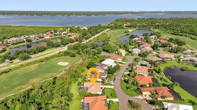13791 Palmetto Point Ct, Port Charlotte, FL 33953 - birds eye view of property featuring a water view, view of golf course, and a residential view