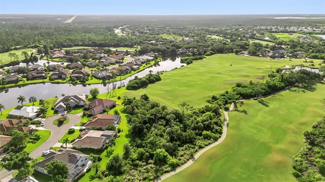 13791 Palmetto Point Ct, Port Charlotte, FL 33953 - bird's eye view with a water view, golf course view, and a residential view