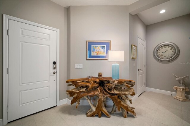 entrance foyer with light tile patterned flooring