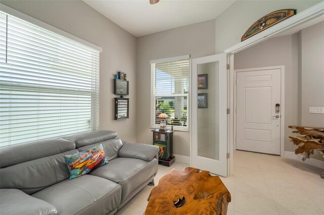 living room with light tile patterned floors