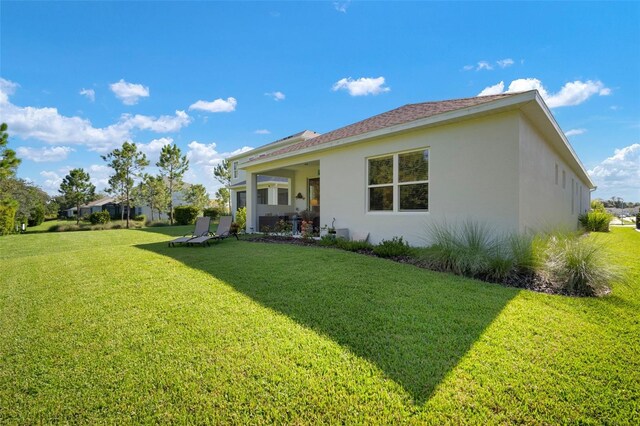 exterior space featuring a lawn